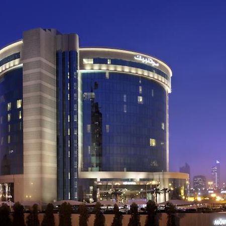 Moevenpick Hotel Al Khobar Exterior photo The hotel at night